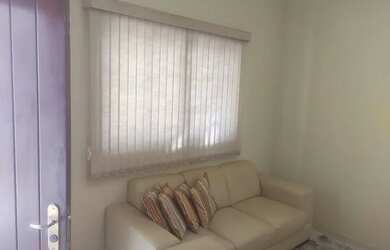 Imagem: A casa possui 3 Dormitórios, 2 Banheiros, 1 Vaga na garagem