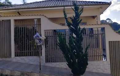 Imagem: A casa possui 3 Dormitórios, 3 Banheiros, 5 Vagas na garagem