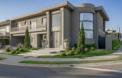 Imagem: A casa em condomínio possui 4 Dormitórios, 3 Banheiros, 479m²