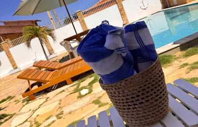 Imagem: A casa possui 4 Dormitórios, 5 Banheiros, Imóvel mobiliado