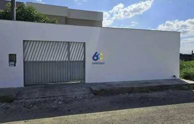 Imagem: A casa possui 3 Dormitórios, 5 Banheiros, 4 Vagas na garagem