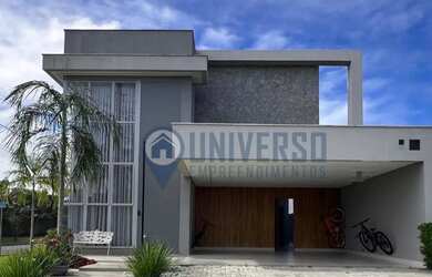 Imagem: A casa em condomínio possui 4 Dormitórios, 5 Banheiros, 300m²