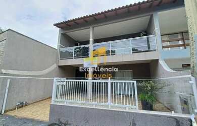 Imagem: A casa possui 3 Dormitórios, 3 Banheiros, 3 Vagas na garagem