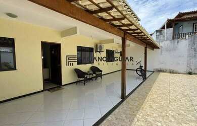 Imagem: A casa possui 3 Dormitórios, 3 Banheiros, 3 Vagas na garagem