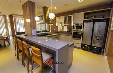 Imagem: O apartamento e possui 3 Dormitórios, Suítes, 4 Banheiros