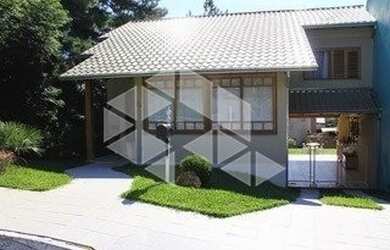 Imagem: A casa em condomínio possui 3 Dormitórios, 2 Banheiros, 2