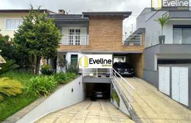 Imagem: A casa em condomínio possui 4 Dormitórios, 4 Banheiros, 5