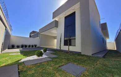 Imagem: A casa possui 3 Dormitórios, 4 Banheiros, 5 Vagas na garagem