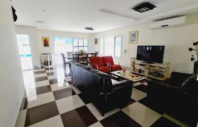 Imagem: A casa possui 5 Dormitórios, 5 Banheiros, 5 Vagas na garagem