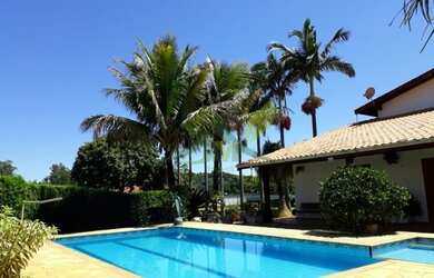 Imagem: A casa em condomínio possui 4 Dormitórios, 4 Banheiros, 5