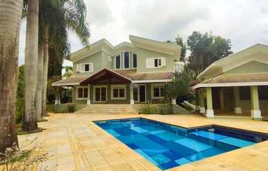 Imagem: A casa em condomínio possui 4 Dormitórios, 5 Banheiros, 5