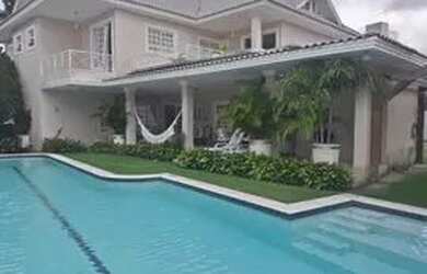 Imagem: A casa em condomínio possui 5 Dormitórios, 5 Banheiros, 5