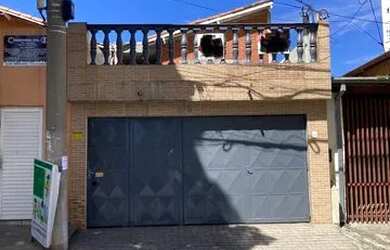 Imagem: A casa possui 2 Dormitórios, 1 Banheiro, 2 Vagas na garagem