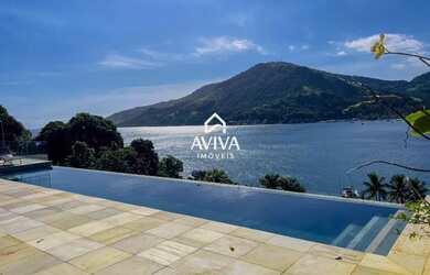 Imagem: A casa em condomínio à venda possui 4 Dormitórios, 5 Banheiros