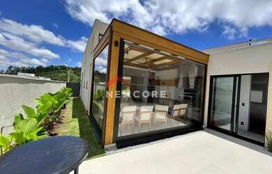 Imagem: A casa em condomínio possui 3 Dormitórios, 4 Banheiros, 3