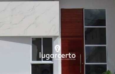 Imagem: A casa possui 3 Dormitórios, 2 Banheiros, 2 Vagas na garagem