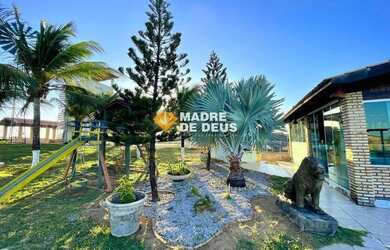 Imagem: A casa possui 5 Dormitórios, 5 Banheiros, 5 Vagas na garagem