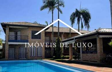 Imagem: A casa em condomínio possui 5 Dormitórios, 5 Banheiros, 5