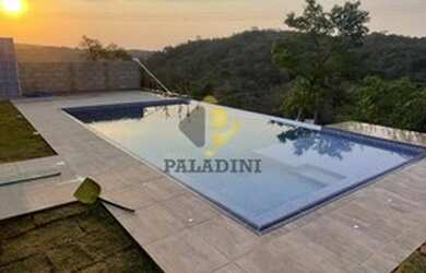 Imagem: A casa possui 4 Dormitórios, 5 Banheiros, 5 Vagas na garagem