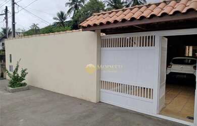 Imagem: A casa possui 3 Dormitórios, 2 Banheiros, 3 Vagas na garagem