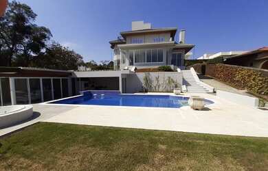 Imagem: A casa em condomínio à venda possui 3 Dormitórios, 5 Banheiros