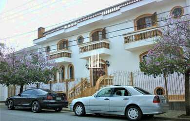 Imagem: A casa possui 3 Dormitórios, 5 Banheiros, 5 Vagas na garagem