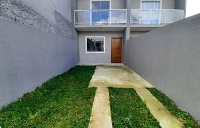 Imagem: A casa possui 2 Dormitórios, 1 Banheiro, 2 Vagas na garagem