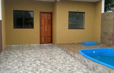 Imagem: A casa possui 2 Dormitórios, 2 Banheiros, 2 Vagas na garagem