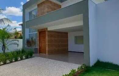 Imagem: A casa possui 5 Dormitórios, 5 Banheiros, 4 Vagas na garagem