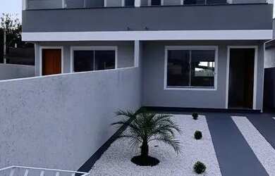 Imagem: A casa possui 2 Dormitórios, 1 Banheiro, 2 Vagas na garagem