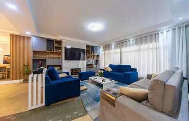 Imagem: A casa possui 5 Dormitórios, 5 Banheiros, 4 Vagas na garagem