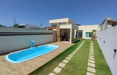 Imagem: A casa possui 3 Dormitórios, 3 Banheiros, 3 Vagas na garagem