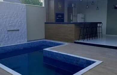 Imagem: A casa possui 3 Dormitórios, 2 Banheiros, 2 Vagas na garagem