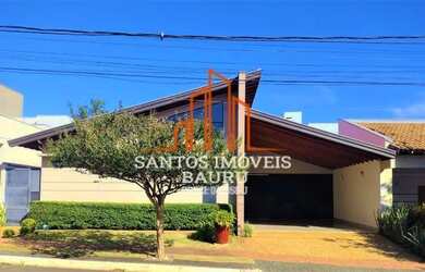 Imagem: A casa possui 3 Dormitórios, 4 Banheiros, 2 Vagas na garagem