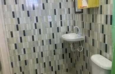 Imagem: A casa possui 3 Dormitórios, 4 Banheiros, 2 Vagas na garagem