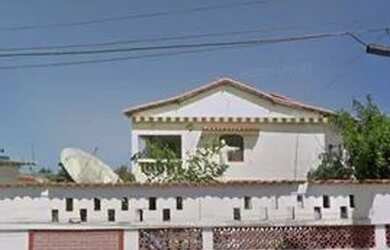 Imagem: A casa possui 5 Dormitórios, 5 Banheiros, 3 Vagas na garagem