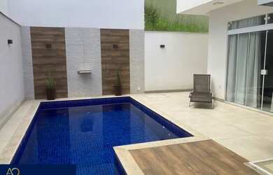 Imagem: A casa possui 3 Dormitórios, 3 Banheiros, 2 Vagas na garagem