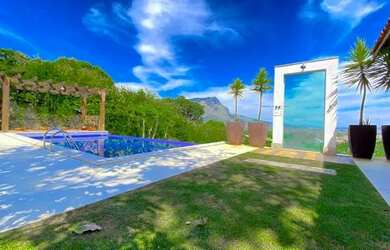 Imagem: A casa possui 4 Dormitórios, 5 Vagas na garagem, 340m² de