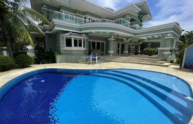 Imagem: A casa em condomínio possui 4 Dormitórios, 5 Banheiros, 5