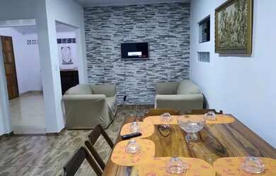 Imagem: A casa possui 2 Dormitórios e 1 Vaga na garagem e está localizado