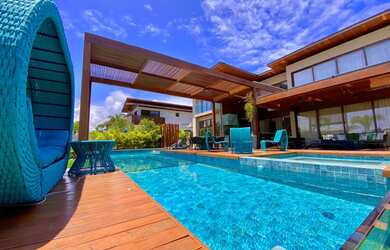 Imagem: A casa em condomínio possui 5 Dormitórios, 5 Banheiros, 4