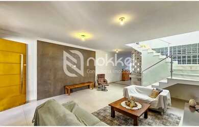 Imagem: A casa possui 3 Dormitórios, 3 Banheiros, 3 Vagas na garagem