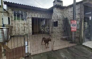 Imagem: A casa possui 2 Dormitórios, 2 Banheiros, 2 Vagas na garagem