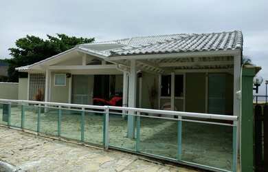 Imagem: A casa possui 5 Dormitórios, 4 Banheiros, 3 Vagas na garagem