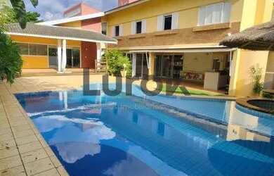 Imagem: A casa em condomínio possui 4 Dormitórios, 5 Banheiros, 5