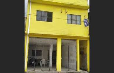 Imagem: A casa possui 3 Dormitórios, 2 Vagas na garagem e está localizado