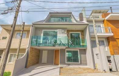 Imagem: A casa à venda possui 3 Dormitórios, 3 Banheiros, 2 Vagas