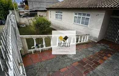 Imagem: A casa possui 3 Dormitórios, 2 Banheiros, 1 Vaga na garagem