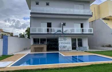 Imagem: A casa em condomínio possui 5 Dormitórios, 5 Banheiros, 4