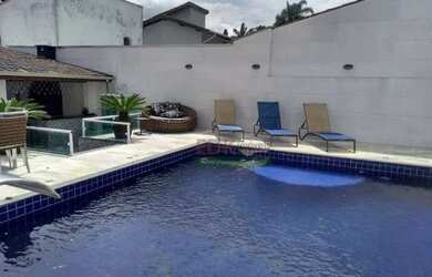 Imagem: A casa possui 3 Dormitórios, 4 Banheiros, 3 Vagas na garagem